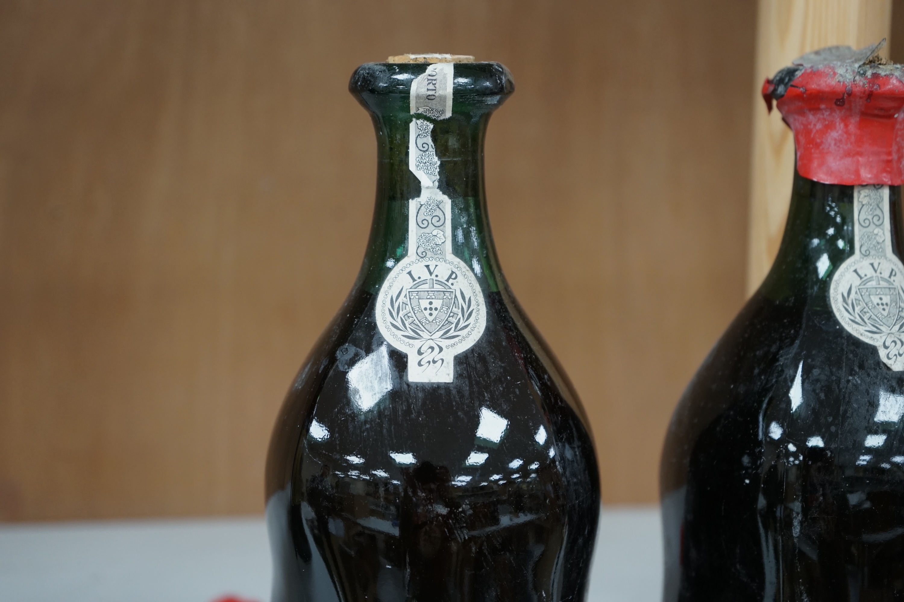 Three bottles of Porto Dalva house reserve port, comprising; 1934, 1940 and 1941. Condition - fair, some wear to labels and seals, etc.